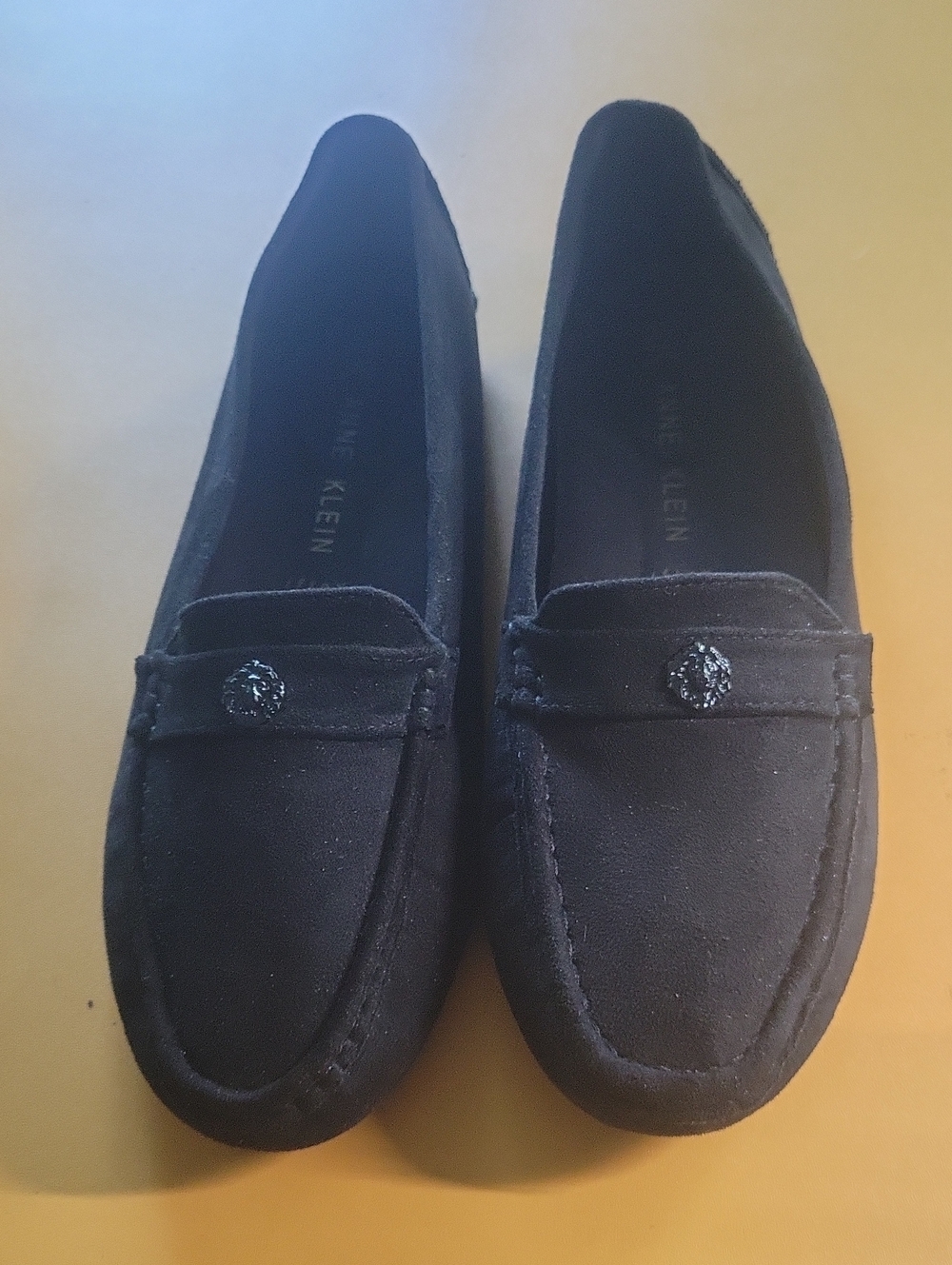 NWOT Anne Klein Black Suede Penny Loafers with Decorative Emblem